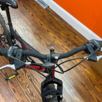 Front view of a Hyper Shocker 26 bike highlighting the handlebars.