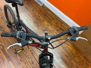 Front view of a Hyper Shocker 26 bike highlighting the handlebars.