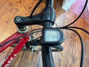 View of vintage Univega Rover Sport bicycle showing working aftermarket cycle computer.