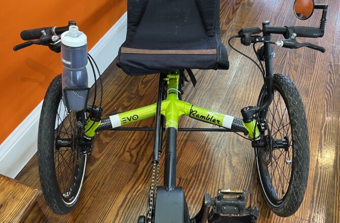 Front view of a TerraTrike E.V.O. showing the tadpole frame, front wheels, and e‑assist system.