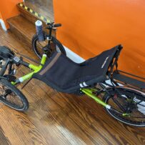 Side view of the TerraTrike E.V.O. highlighting the frame, seat position, and electric assist components.