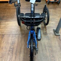Rear view of ICE Adventure recumbent trike rear wheel with 20‑inch tire and Shimano Steps motor.