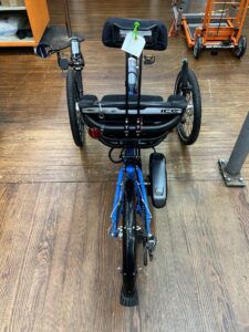 Rear view of ICE Adventure recumbent trike rear wheel with 20‑inch tire and Shimano Steps motor.