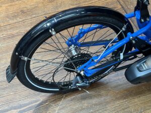 Rear wheel of ICE Adventure recumbent trike rear wheel with 20‑inch tire and Shimano Steps motor.