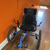 Front view of an ICE Adventure HD 26 FS recumbent trike with Rohloff hub.