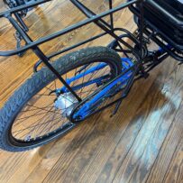 Rear hub and rack of an ICE Adventure HD 26 FS recumbent trike with Rohloff hub.