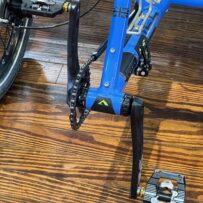 Front boom and cranks of an ICE Adventure HD 26 FS recumbent trike with Rohloff hub.