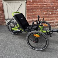 Side view of used Catrike eCAT Villager in Eon Green for sale at Lancaster Recumbent